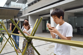 国際交流施設 学生寮にて「流しそうめんパーティー」開催のサムネイル